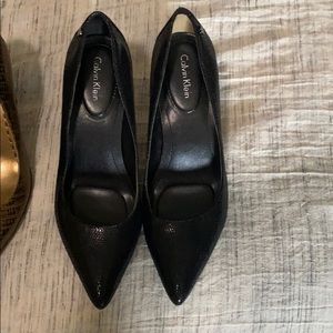 Barely worn CK black pumps